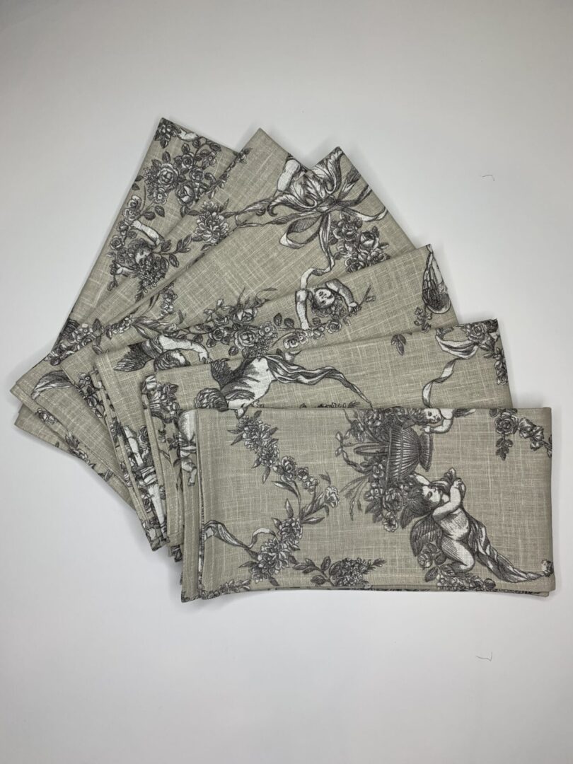 A Set of Female Design Printed Purses in a Gray Color Cloth